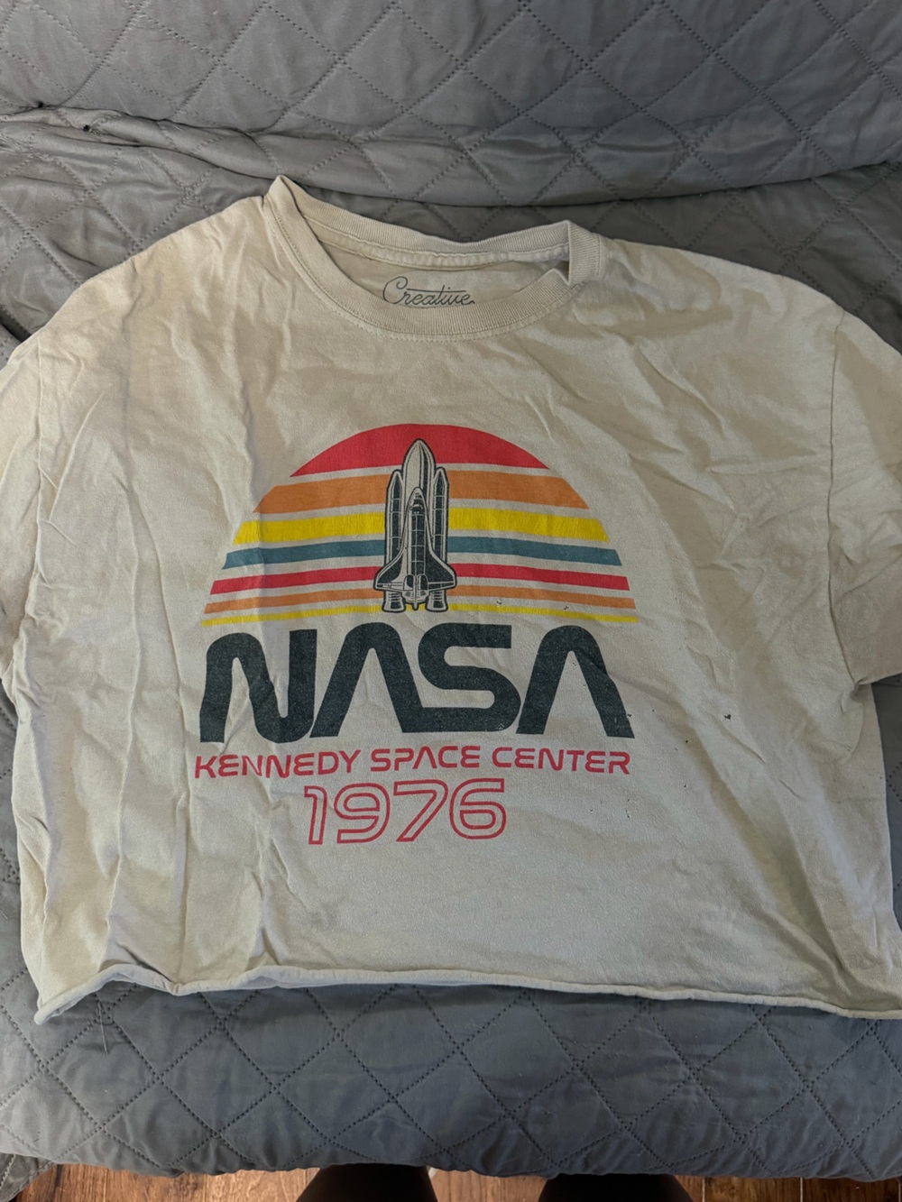 NASA Kennedy Space Center 1976 Retro Graphic Tee - Cream with Rainbow Stripes